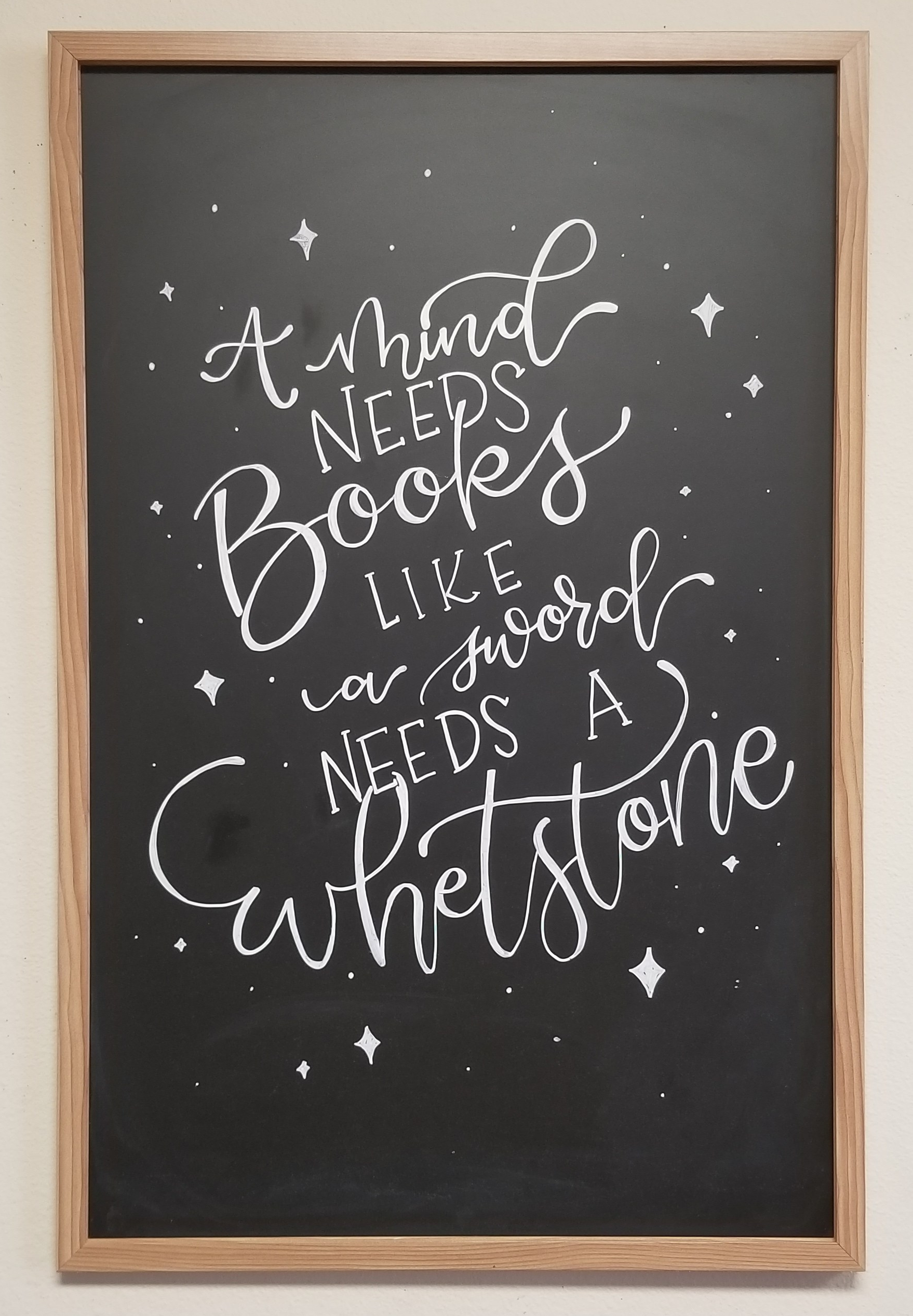a mind needs books like a sword needs a whetstone chalkboard lettering art by swapna gardner the nerd lady